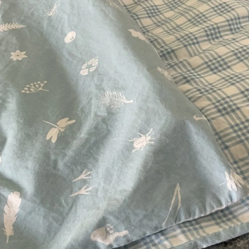 IKEA ‘Vandering Skog’ crib duvet with insert.